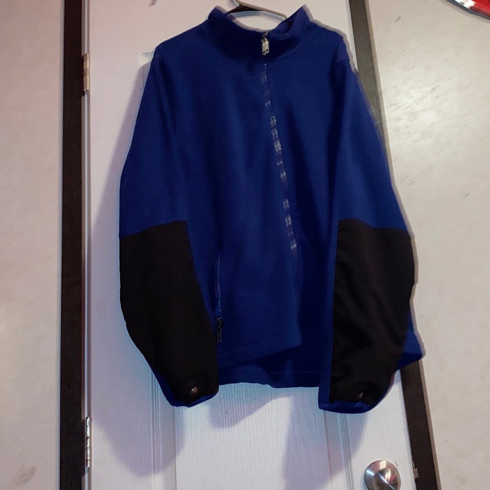 blue and black logan & martin wind jacket